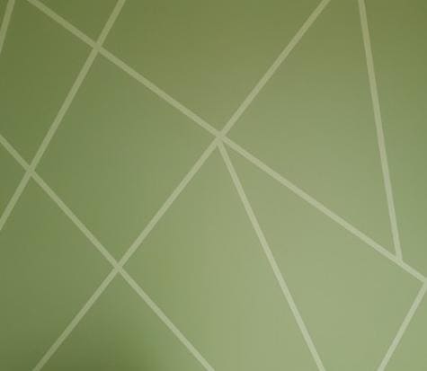 mur vert avec formes géométriques